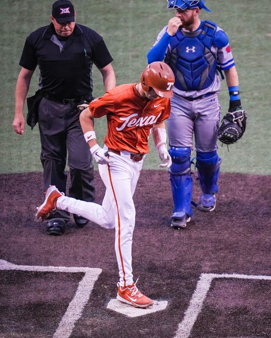 Texas Longhorns infielder Jalin Flores (1) runs home after hitting a home run in the fourth inning of the Longhorns' game against the UT Arlington Mavericks at UFCU Disch-Falk Field, Tuesday, April 23, 2024. Rodriguez is acting head coach while David Pierce is suspended.